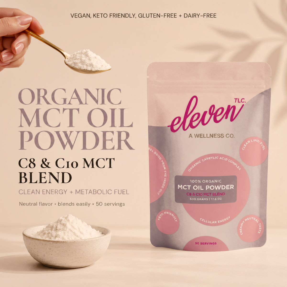 Hand holding a gold spoon of white Eleven TLC organic MCT oil powder beside the 500g pouch and a bowl of powder, labeled organic MCT oil powder, C8 and C10 MCT blend; vegan, keto friendly, gluten-free and dairy-free.