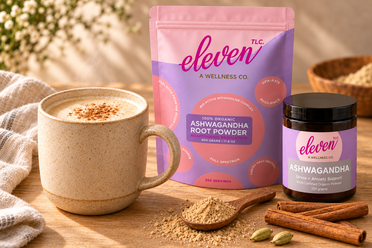 Warm ashwagandha moon milk with cinnamon beside Eleven TLC root powder jar and pouch