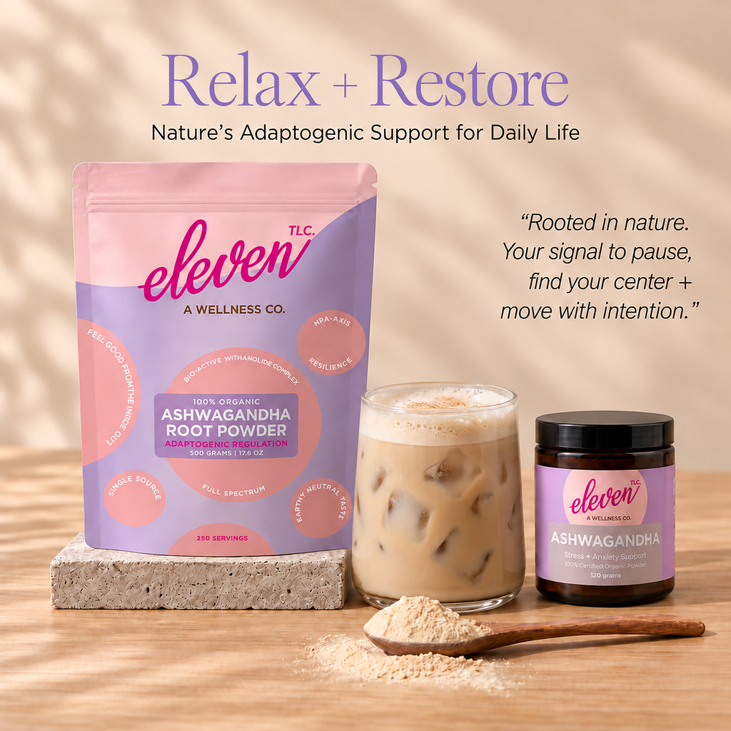 Relax + Restore: Eleven TLC organic ashwagandha root powder 500 g pouch on a stone block beside an iced ashwagandha latte, a 120 g ashwagandha jar and a wooden spoon of beige powder on a warm wood surface. Text reads Nature’s Adaptogenic Support for Daily Life.