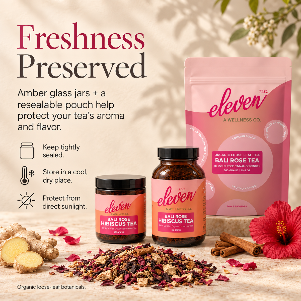 Eleven TLC Bali Rose Hibiscus Tea jars and pouch with botanicals on cream travertine. Keep sealed in a cool, dry place away from sunlight.