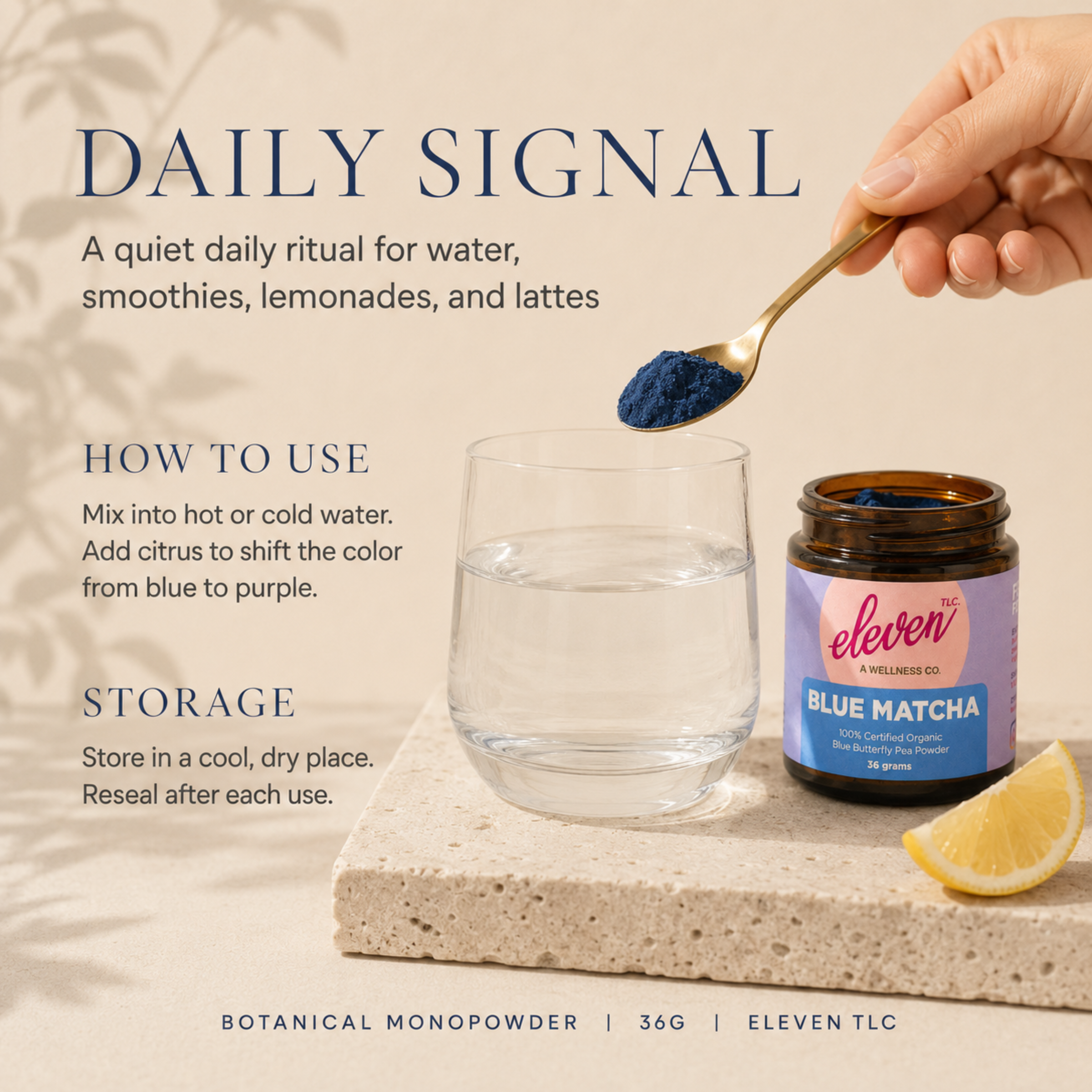Eleven TLC Blue Matcha powder on a spoon above a glass of water beside an open amber jar, for daily use.