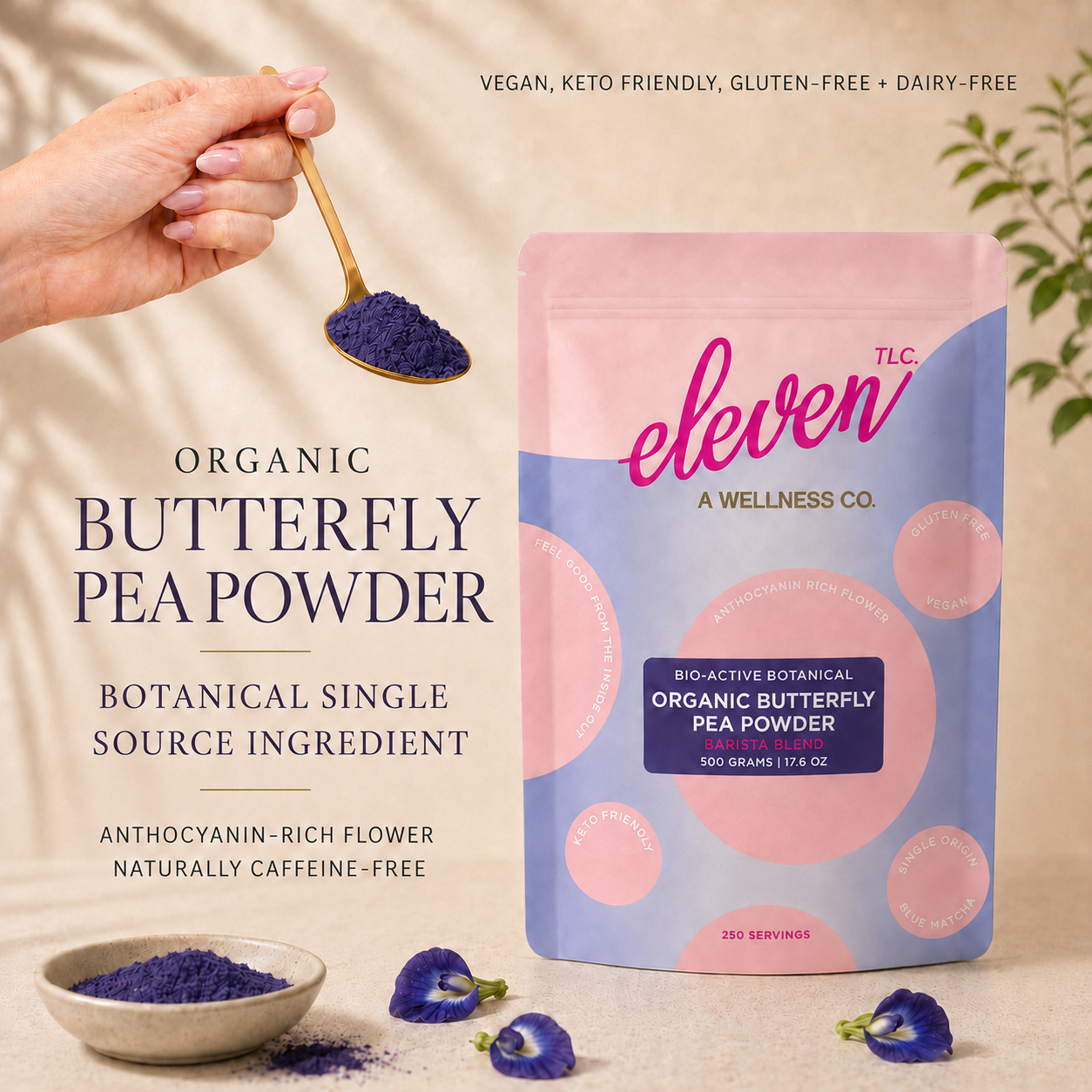 Eleven TLC organic butterfly pea flower powder pouch and spoonful of blue botanical powder on a beige background.