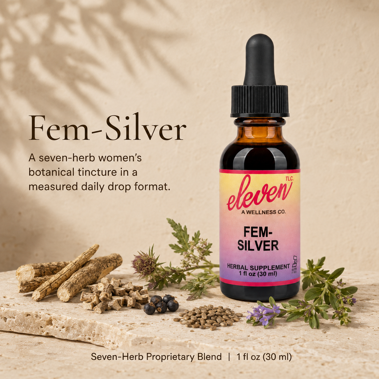 Eleven TLC Fem-Silver 1 oz tincture bottle, dropper cap, surrounded by botanical herbs on a wooden surface.