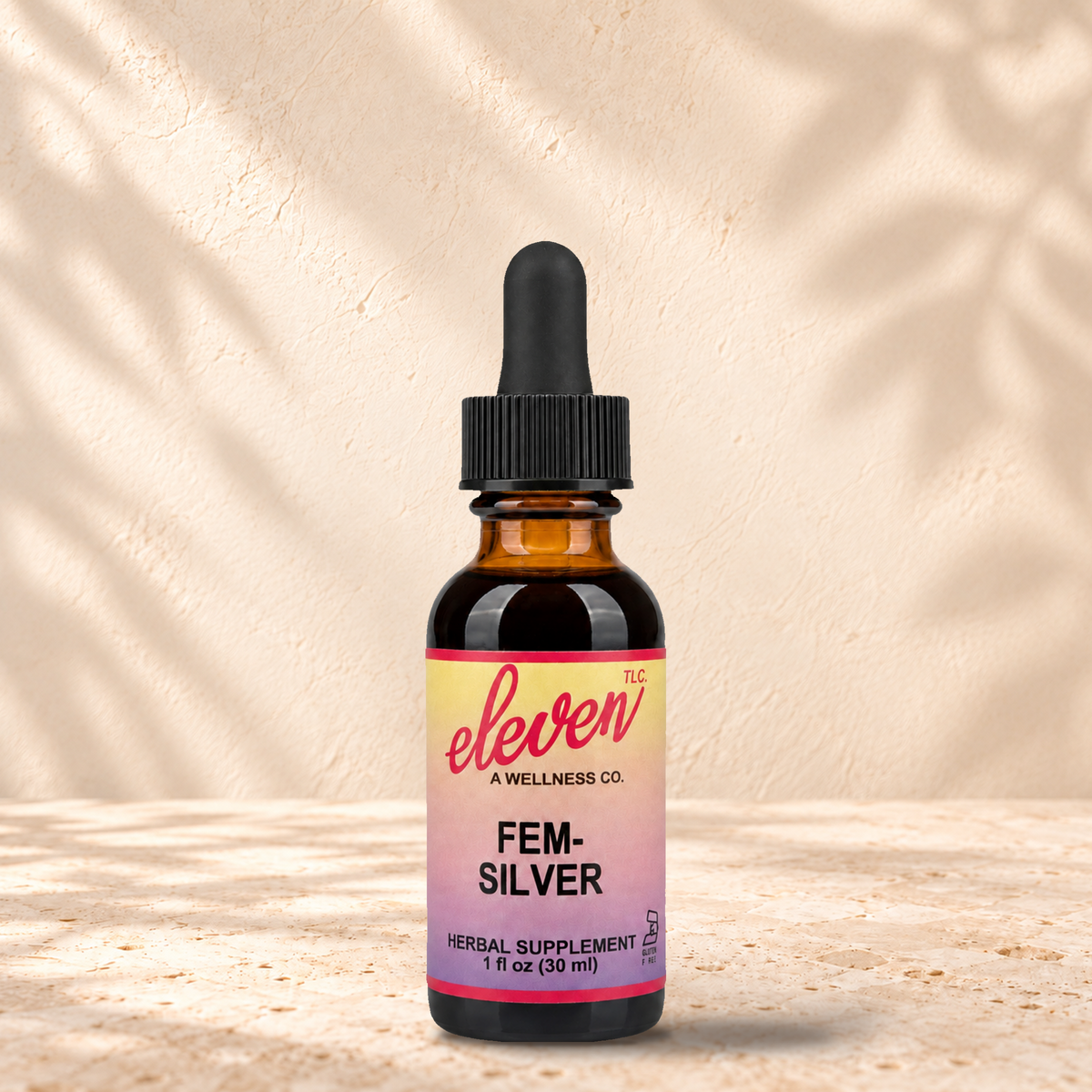Eleven TLC Fem-Silver herbal tincture for menopause support, 1 fl oz amber dropper bottle with pink and yellow label