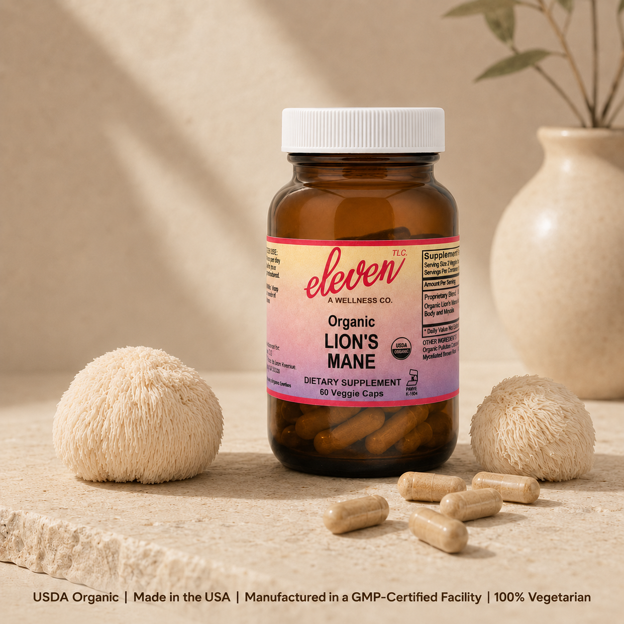 Eleven TLC 60-count Organic Lion's Mane mushroom capsules bottle displayed on neutral surface with dried mushroom specimens.