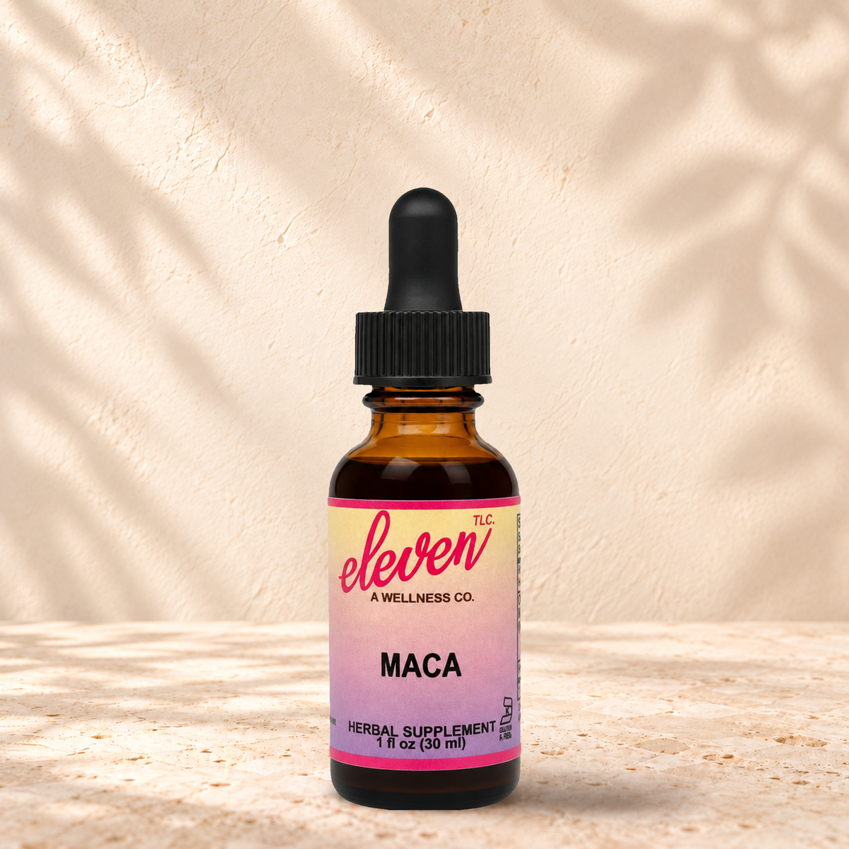 Eleven TLC organic maca root herbal tincture for energy and vitality, 1 fl oz amber dropper bottle with pink and yellow label