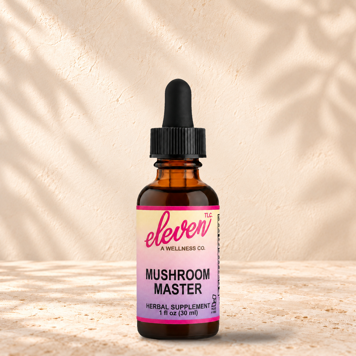 Eleven TLC Mushroom Master herbal tincture for daily immune wellness, 1 fl oz amber dropper bottle with pink and yellow label