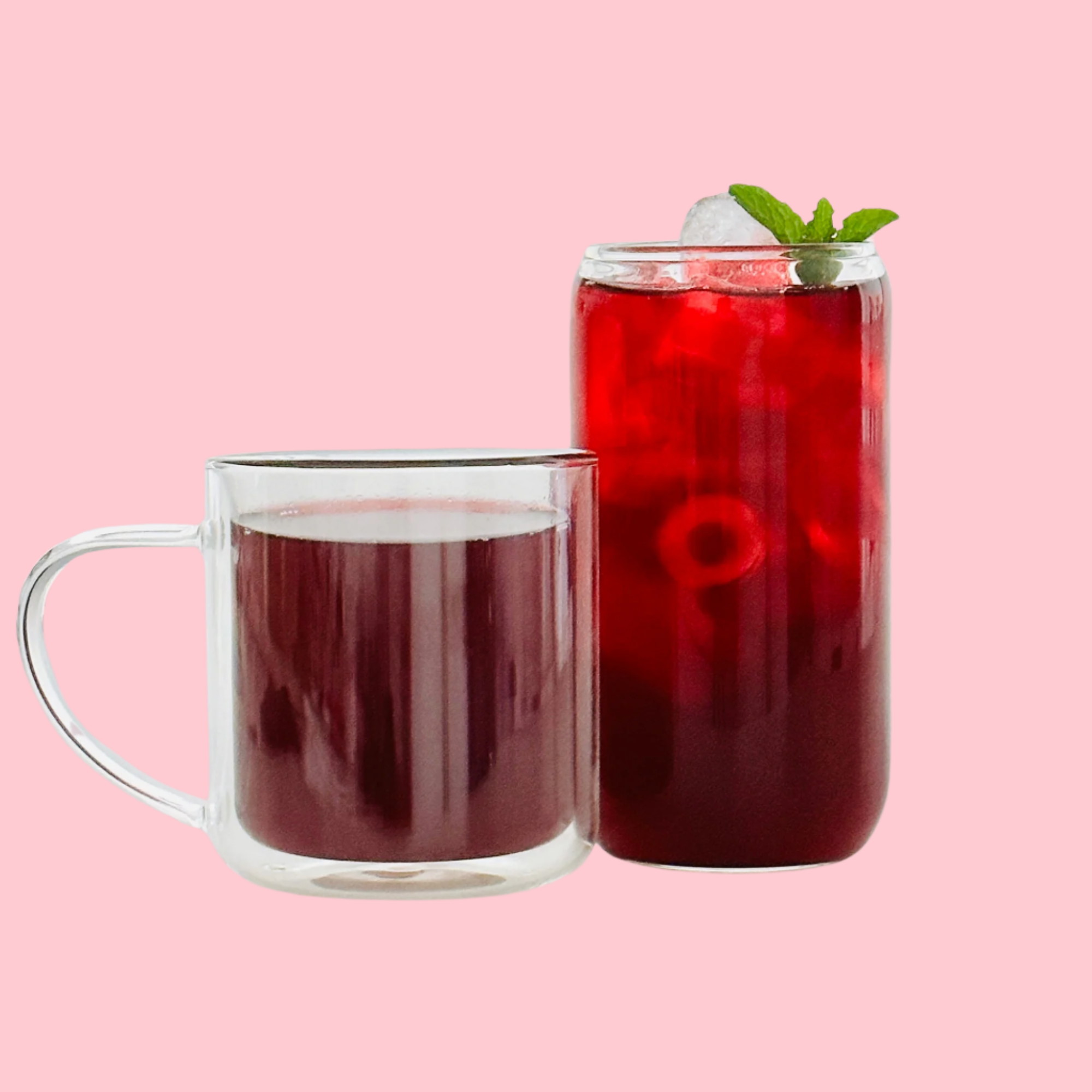 Organic loose leaf tea featuring hibiscus, ginger, rose, and cinnamon, styled beautifully with a hot tea cup and refreshing iced drink